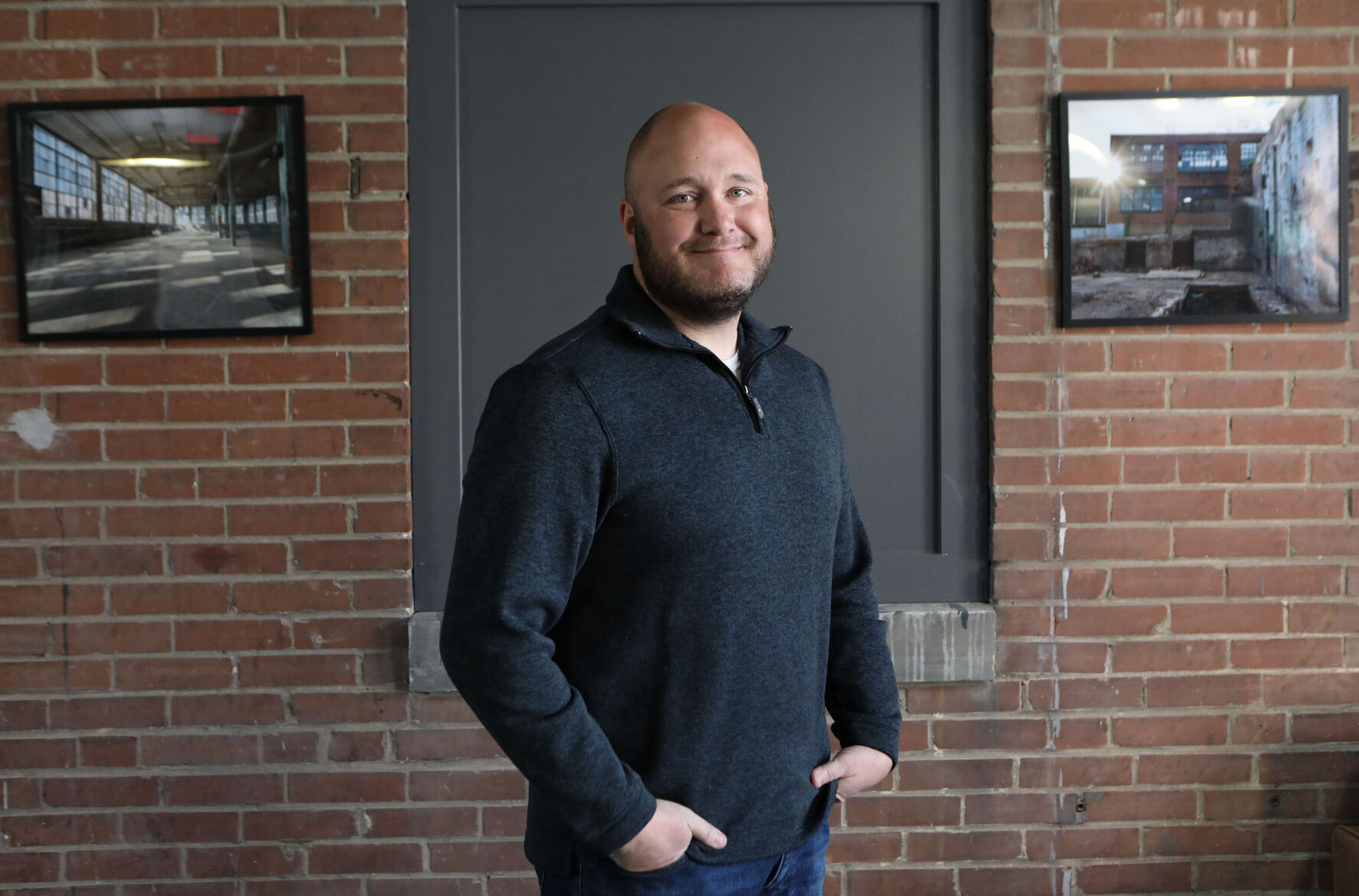 Ed Schmelz stands in Shoe Factory Lofts lobby